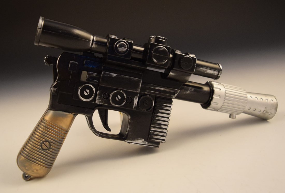 Han Solo DL-44 Blaster: A vintage Han Solo DL-44 blaster gun Measures: 12 inches in size Gun is marked "Lucas Film LTD"