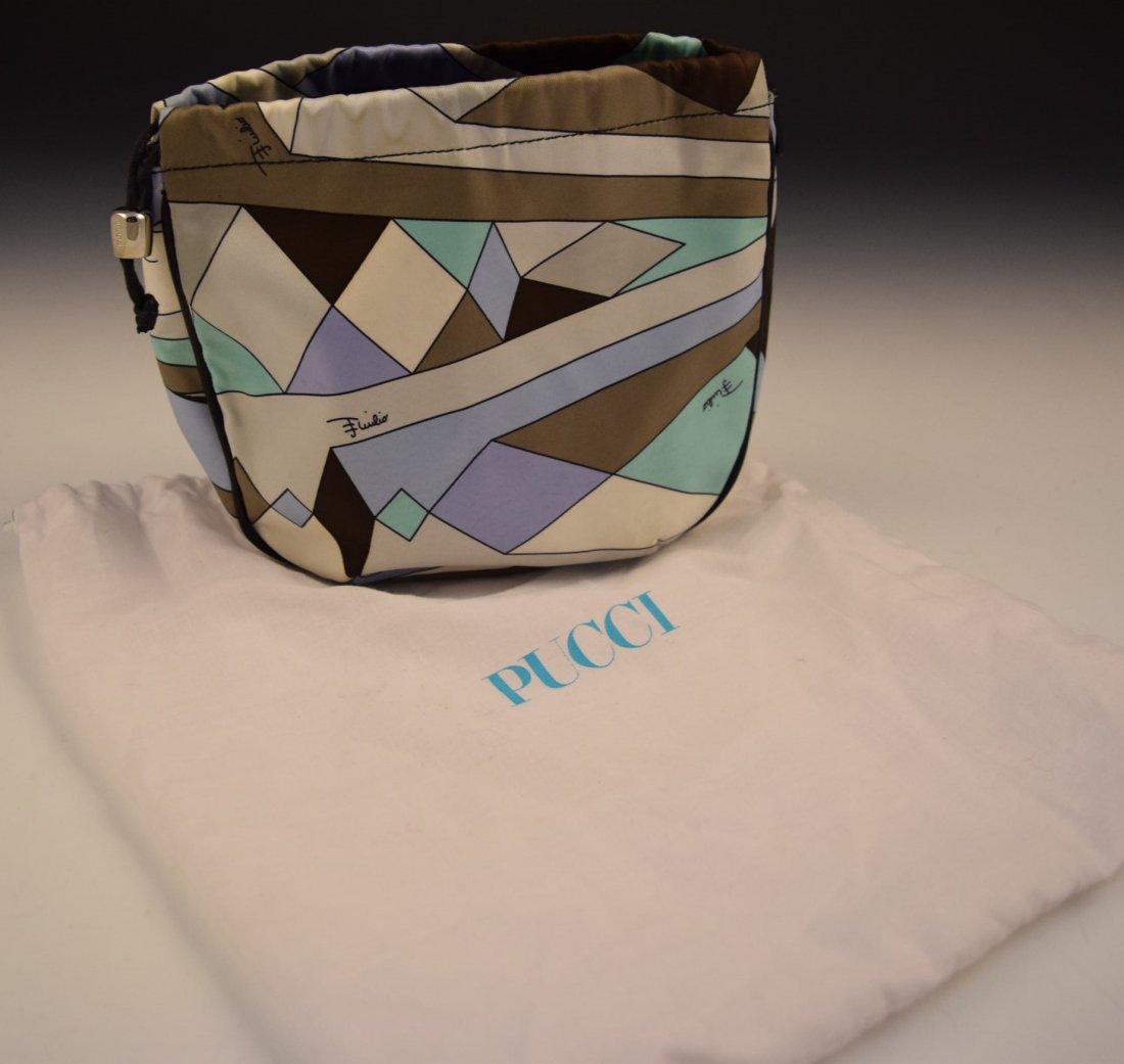 Emilio Pucci Carrying Pouch: Multi color canvas pouch issued from Emilio Pucci Measures: 7 x 8 inches