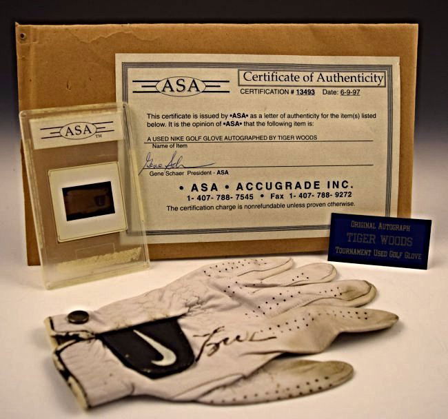 Tiger Woods Signed Tournament Glove: Glove owned and worn by Tiger Woods Signed in marker COA included