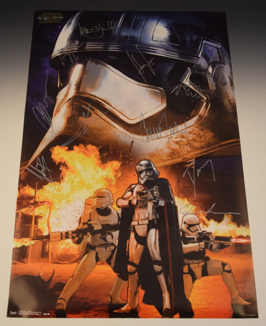 Star Wars The Force Awakens Poster: Signed by: Harrison Ford, Daisy Ridley, Carrie Fisher, Mark Hamill, George Lucas, J.J. Abrams, Adam Driver, John Boyega, Gwendoline Christie, Oscar Issac and Andy Serkis Measures: 34 x 22 inches COA i