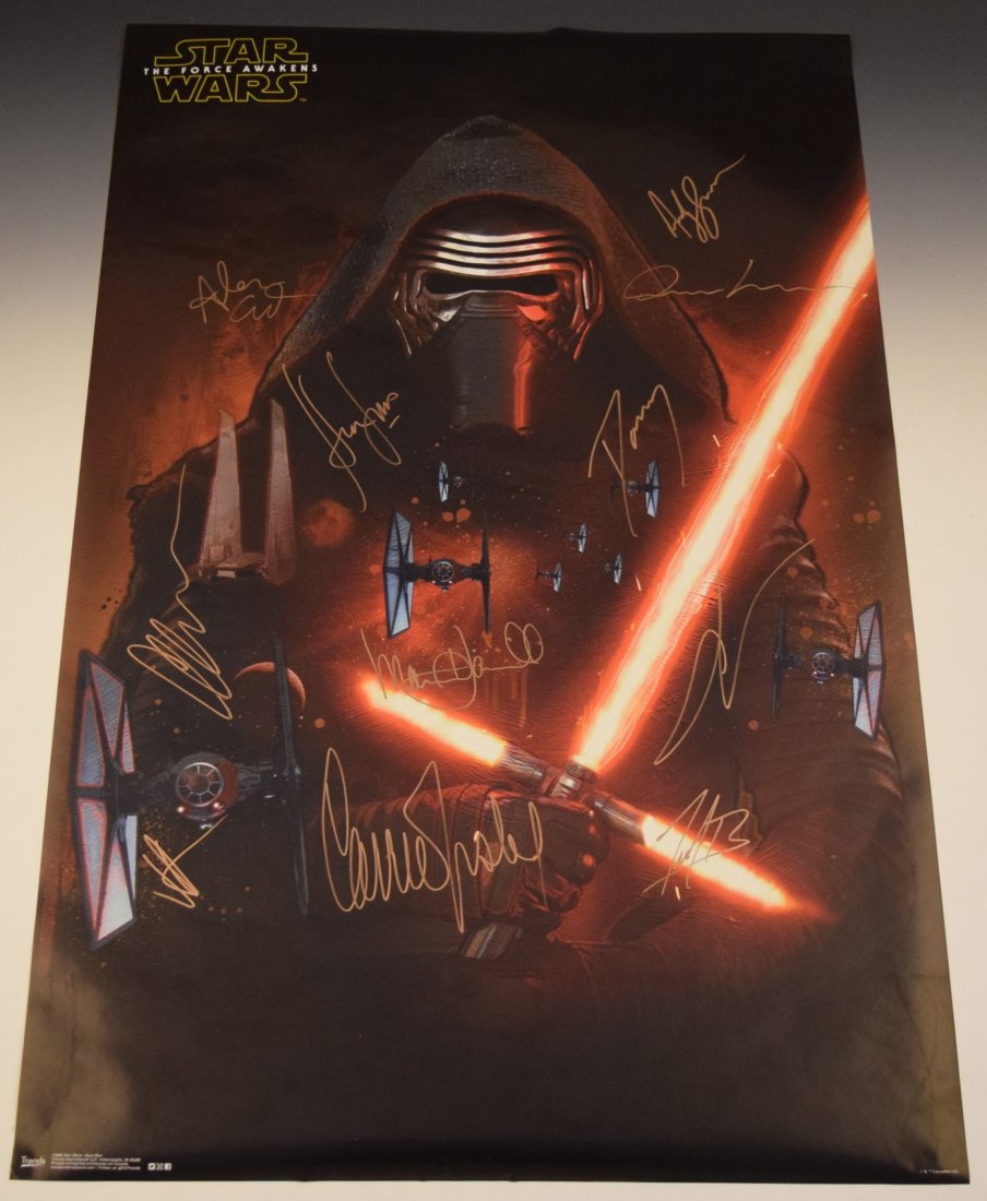 Star Wars The Force Awakens Poster: Signed by: Harrison Ford, Daisy Ridley, Carrie Fisher, Mark Hamill, George Lucas, J.J. Abrams, Adam Driver, John Boyega, Gwendoline Christie, Oscar Issac and Andy Serkis Measures: 34 x 22 inches COA i