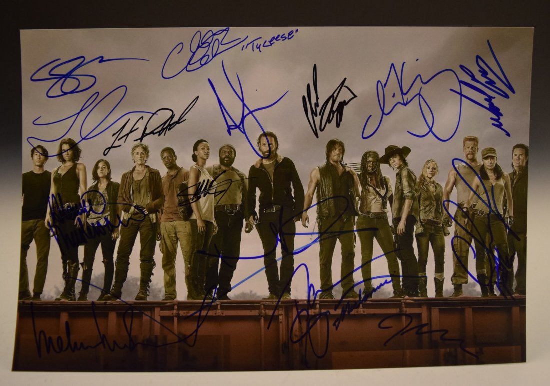 The Walking Dead Cast Signed Photo: Signed by: Andrew Lincoln, Norman Reedus, Danai Gurira, Steve Yeun, Lauren Cohan, Michael Cudlitz, Alanna Masterson, Melissa McBride, Chandlar Riggs, Laurence Gilliard Jr., Chad L. Coleman, Sonequoa M