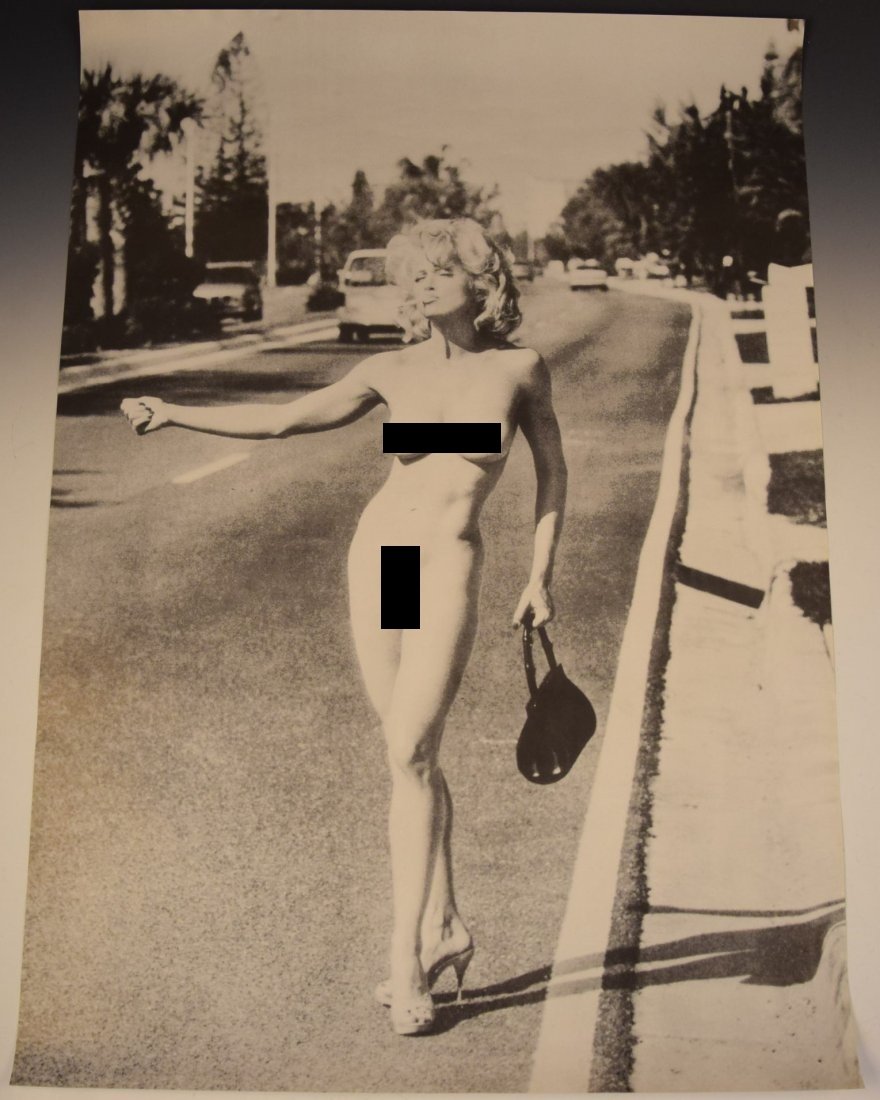 Nude Madonna Poster: A rare black and white poster depicting a nude Madonna walking down a street smoking a cigarette Measures: 24 x 33 inches