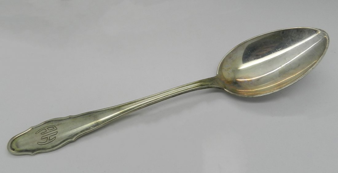 Adolf Hitler Personal Dinner Spoon: Personal silver dinner spoon owned and used by Adolf Hitler Silver spoon inscribed with initials of AH designed by Albert Speer The spoon was acquired in 1945 and was sent back to the US from Germany