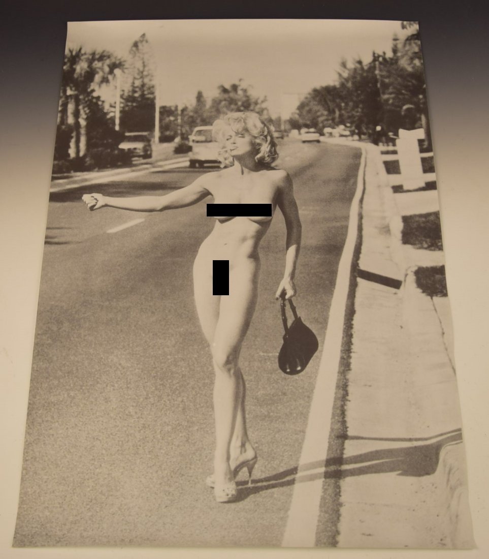 Nude Madonna Poster: A rare black and white poster depicting a nude Madonna walking down a street smoking a cigarette Measures: 24 x 33 inches