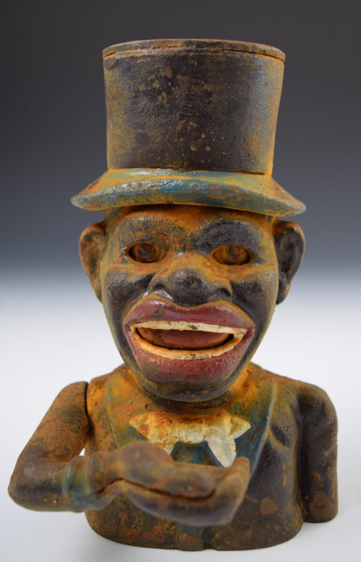 Black Americana Cast Iron Bank: Black Americana Jolly "Negro" cast iron bank J.E. Stevens Measures: 8 x 5 x 5 inches
