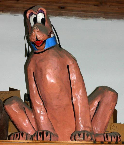 Walt Disney Pluto Figure: Signed Walt Disney Productions on bottom-paper mache'. From 1950's Large approx 5 ft by 5 ft. Has nose damage.