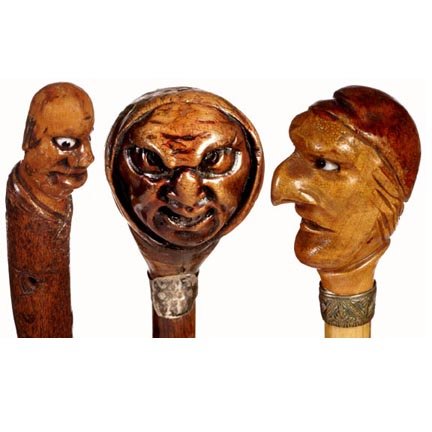 Three Carved Face Canes -C.1878-1910- A group pf t