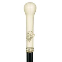 German Hunting Dog Cane: German Hunting Dog-C. 1870-A carved ivory handle done in high relief, ebony shaft and a bronze ferrule-H. 4 ¾" x 1 ¼"-OL. 36"-$500-$800