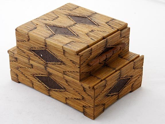 Vintage tramp art two layer cigar box constructed : Vintage tramp art two layer cigar box constructed with matchsticks. Piece measures 6 1/4 x 5 1/2 x 8 3/4
