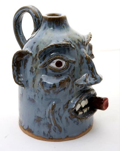 Fran Van Dorsten. "Cigar Smoker". Fired and glaze: Fran Van Dorsten. "Cigar Smoker". Fired and glaze pottery, signed and dated 2006 and measures 9 x 9
