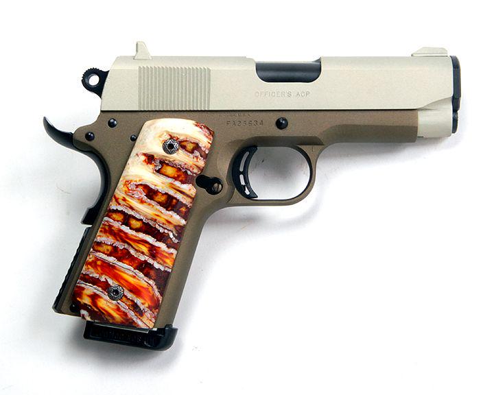 Colt Officers model 45/1911, two toned, fossilized: Colt Officers model 45/1911, two toned, fossilized walrus grips and factory grips, 3 1/2" barrell, 2 mags, original case and paperwork