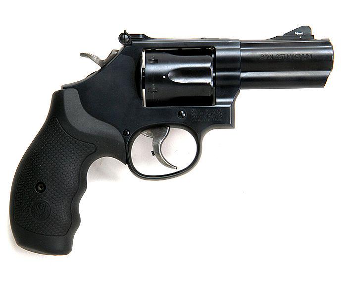 Smith and Wesson Model 19 357 mag, performance center: Smith and Wesson Model 19 357 mag, performance center gun, factory rubber grips and factory wood and cocobolo grip, 3" ported barrell, original case and paperwork