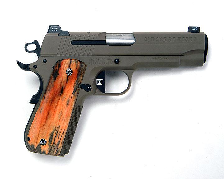 Sig Sauer 1911 45 cal, FDE finish, on sider slide: Sig Sauer 1911 45 cal, FDE finish, on sider slide "ALWAYS BE READY", trijicon sites, 4 1/2" barrell, camel bone and factory grips, 1 mag, original hard box and paperwork