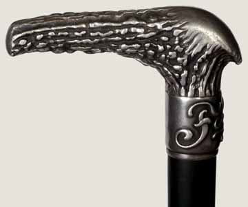 Signed Sterling Tiffany Cane-Early 20th Century-A: Signed Sterling Tiffany Cane-Early 20th Century-A signed Tiffany and Co. sterling heavy ornate handle which screws to the shaft with space to hide something in the handle, ebony shaft which is more co