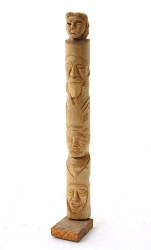 Carved totem and outsider art lot: Carved wood totem measuring 8 3/4 x 2 and Sarah Mary Taylor, "Baseball Game with Cheerleaders". Marker on paper, and measured 16 x 22 and John W. Banks- "The Night in the Old Swimming Hole. Crayon and