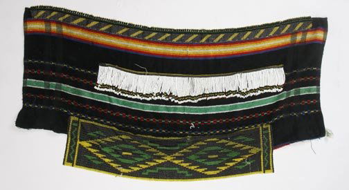 Ndebele sex cache modesty &other ethnic items: Ndebele sex cache modesty apron on tea towel, all cotton with beadwork and measures 36 x 14 and Childs animal, oriental hat and African relief carved floral design seat, 1960's vintage and measures 17