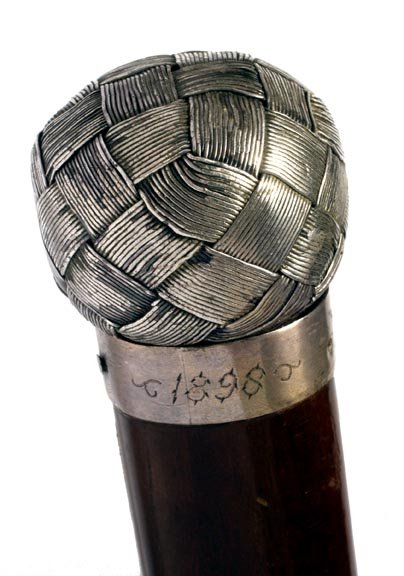 Historical Battle of San Juan Hill Cane: Historical Battle Cane-Dated 1898-A heavy basket woven silver handle, inscribed silver collar "O. B. C. 1898 San Juan Hill Cuba", rich snakewood shaft and a bi-metal ferrule-H. 1 ¼" x 1", O.L. 35 ¾"