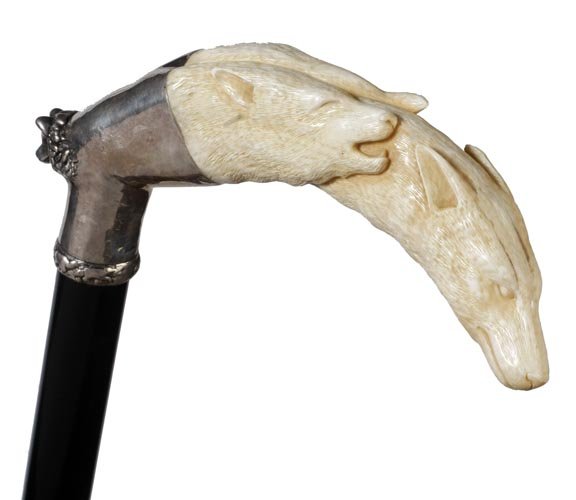 Ivory Wolf Pack Cane: Ivory Wolf Pack-Circa 2005-A custom ivory and silver cane from the workshop of Charles Daugherty. Three ornately carved wolves, large ornate signed sterling handle extension with a beautiful cast wolf