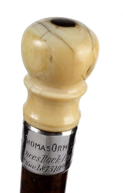 Bombay Indian Nautical Presentation Cane: Bombay India Nautical Presentation-Dated 1879-A carved ivory whales tooth handle with a baleen roundel atop, silver collar with the following presentation "Thomas Ormiston Princess Doc Bombay 11th Nov