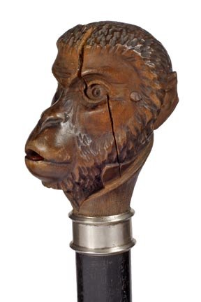 Monkey Automation Cane- Late 19th Century- A carved: Monkey Automation Cane- Late 19th Century- A carved monkey with a button in the rear of his head. When the button is pressed, the eyes roll back to show a pair of bright red eyes and his red tongue st