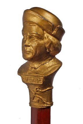 Columbus Pewter Cane- Late 19th Century- A gold pai: Columbus Pewter Cane- Late 19th Century- A gold painted head which is probably an expo cane, hardwood shaft and a brass ferrule. H. 3 ¾" x 1 ¾" O.L. 36" $150-$250