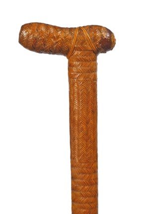 Straw Covered Cane- Early 18th Century- A seldom f: Straw Covered Cane- Early 18th Century- A seldom found woven straw (possibly a prisoner of war example) cane over wood. It has some damage to the handle and a metal ferrule. O.L. 35" $500-$700