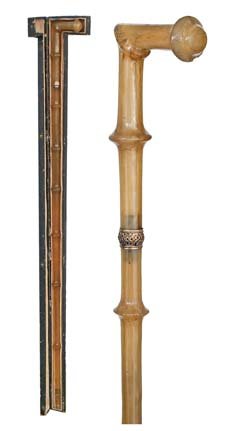 Rhino Dress Cane-Circa 1880-A fine French Colonial : Rhino Dress Cane-Circa 1880-A fine French Colonial Dress Cane in it's original presentation box, ornate gold collar and a gold gilt ferrule, fine condition except for a few minor "chigger bites" on th