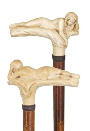 French Ivory Nude-Circa 1890-An Art Nouveau, full c: French Ivory Nude-Circa 1890-An Art Nouveau, full carved ivory nude handle, leather collar, malacca shaft and an iron ferrule-H. 5" x 3", O.L. 35 ¼"-$3,000-$5,000