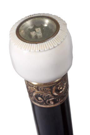 Ivory Game Cane-Early 20th Century-Carved ivory han: Ivory Game Cane-Early 20th Century-Carved ivory handle with a fluted top, three ivory die encased in glass, ornate florentine gold filled collar, ebony shaft and a bi-metal ferrule-H. 1" x 1 ½", O.L.