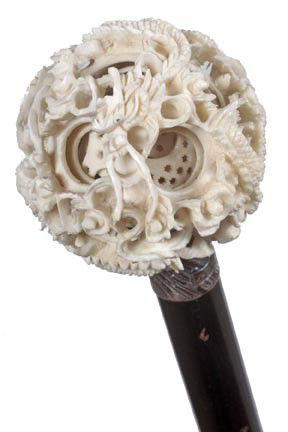 English Mascot Cane-Late 19th Century-A carved ivor: English Mascot Cane-Late 19th Century-A carved ivory puzzle ball with several balls within. The outer ball is carved with a fine and intricate dragon, English hallmarked collar, ebonized shaft and a h