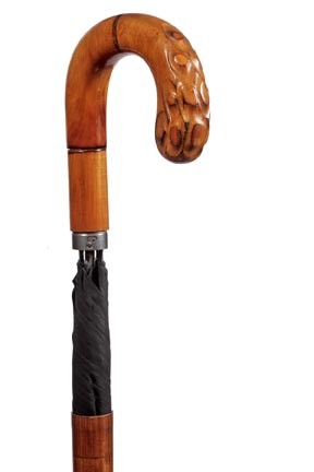 Umbrella System Stick Cane-Circa 1950-A hardwood c: Umbrella System Stick Cane-Circa 1950-A hardwood carved telescoping shaft, umbrella in nice condition and a metal ferrule-O.L. 34 ½"-$150-$250