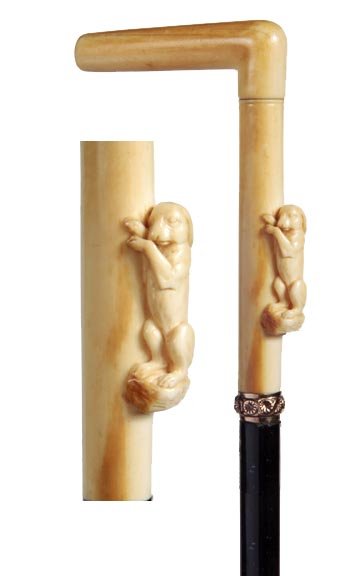 Ivory Rabbit Cane-Circa 1875-A carved ivory rabbit,: Ivory Rabbit Cane-Circa 1875-A carved ivory rabbit, gold filled ornate collar, ebony shaft and a bi-metal ferrule-H. 2 ¾" x 4 ¾", O.L. 39"-$300-$500