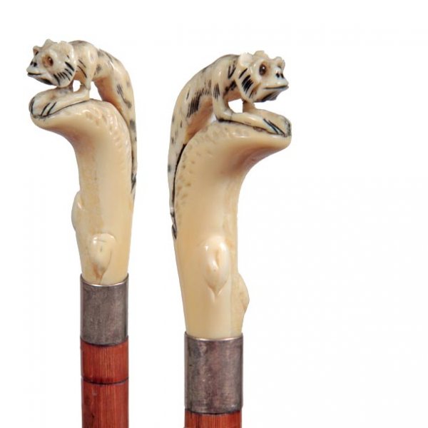 Ivory Creature Cane-Early 20th Century-A carved wei: Ivory Creature Cane-Early 20th Century-A carved weird looking jungle animal with two color glass eyes and India inking, signed sterling collar, carved hardwood faux bamboo shaft and an ivory ferrule-H