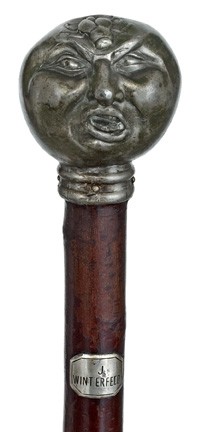 Whimsy Pewter Cane- Late 19th Century-A one piece : Whimsy Pewter Cane- Late 19th Century-A one piece pewter handle which is probably heavy enough to be called a defensive cane, with a bug over an angry face, wild cherry shaft with silver escutcheon en