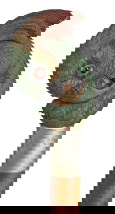 Carved Viennese Cockatiel Cane- Circa 1900-A very: Carved Viennese Cockatiel Cane- Circa 1900-A very large carved and colored head with glass eyes, white metal collar, full bark malacca shaft and a brass ferrule, near mint condition-H. 3 ¾" x 3"-OL.