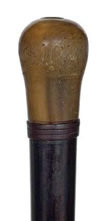 Compass Gadget Cane- Circa 1875-Rhino horn knob wit: Compass Gadget Cane- Circa 1875-Rhino horn knob with inset compass, blue steel hand under tins glass cover, perfectly working. Rosewood shaft and a horn ferrule-H. 13/4" x 1 ¼", OL. 36 ¼" $500-$900