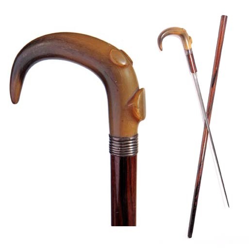 Horn Sword Cane-Circa 1900-Carved handle with thum: Horn Sword Cane-Circa 1900-Carved handle with thumb rest, ribbed silver collar, four sided 19" locking blade, exotic wood shaft and a metal no ferrule, James Semones Collection-H. 4 ¼" x 3", O.L. 35 