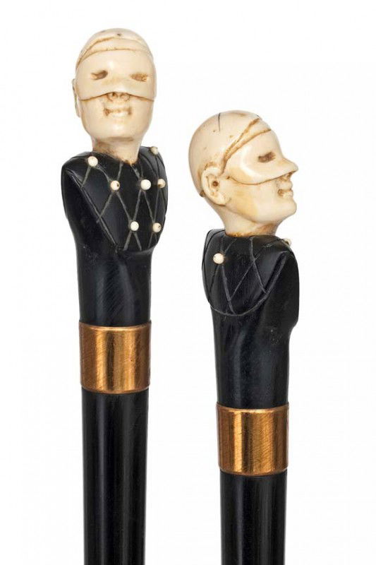 Ebony & Ivory Carnival of Venice figural Cane -Ca.: Ebony & Ivory Carnival of Venice figural Cane -Ca. 1890-This carved unusual subject matter is very striking , ebony shaft, gilt collar and a horn ferrule. The ivory head with mask has a padded ebony b