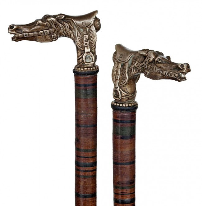 Bludgeon Cane-Ca. 1890-Handle heavy cast in white m: Bludgeon Cane-Ca. 1890-Handle heavy cast in white metal horse head, halter and saddle, the flexible shaft made of leather discs piled on a steel core and a brass ferrule-H. 3" x 1 3/4", O.L. 334 ½" $