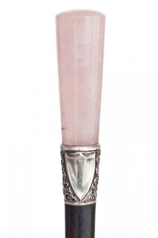Rose Quartz Dress Cane-Early 20th Century- Substant: Rose Quartz Dress Cane-Early 20th Century- Substantial rose quartz handle with a finely chased silver collar and ebony shaft. German hallmarks-H. 2 ¾" x 1", O.L. 33 ½" 500-800