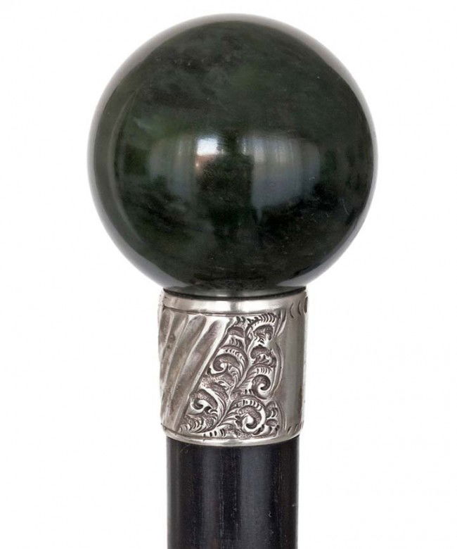 Victorian Hard Stone Dress Cane-Late19th Century-T: Victorian Hard Stone Dress Cane-Late19th Century-The ball handle being a variety of jade, silver collar, ebony shaft and a horn ferrule.-H. 1 ¾" x 1 ¾", O.L. 36 ½"