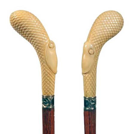Schrimshaw Ivory Dress Cane-Ca. 1895-: The thumb rest of this cane has the name Jefferson in schrimshaw Stylized Ivory Dress Cane-Ca. 1895-An unusual carved handle with thumb rests, ornate gold-filled collar, hardwood shaft and a 3" bi-met
