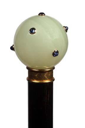 French Jade Dress Cane-Circa 1880-A fabulous 1.5" d: . French Jade Dress Cane-Circa 1880-A fabulous 1.5” diameter jade ball with a surrounding of blue sapphires in gold mounts, tested 18 karat gold collar, ebony shaft and a 1” bi-metal ferrule, the