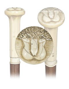 Ivory Erotic Cane-French, 19th Century-Elongated iv: Ivory Erotic Cane-French, 19th Century-Elongated ivory knob with faceted stem and widening circular top engraved with a humorous depiction of a male member. Malacca shaft and a bone ferrule. H. 4 ½"