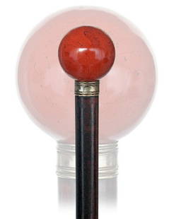 Jasper Dress Cane-Early 20th Century-Polished ball: Jasper Dress Cane-Early 20th Century-Polished ball handle with natural blood red color, rosewood shaft, grooved metal color and a horn ferrule-H. 1 ½" x 1 ½", O.L. 34 ½" $400-$600