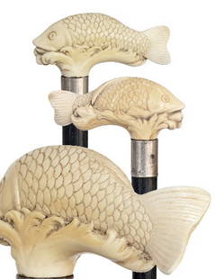 Large German Ivory Fish Cane-Ca. 1890-Carved ivory: Large German Ivory Fish Cane-Ca. 1890-Carved ivory pike on waves done in a master's hand, ebony shaft , silver collar marked 800 in a half-moon and a white metal ferrule.-H. 4 ¾" x 2", O.L. 34"
