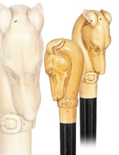 Ivory Dog Cane -19th Century-Well carved substantia: Ivory Dog Cane -19th Century-Well carved substantial ivory handle, ebony shaft and staghorn ferrule. Gracious flair and unusual fine quality and condition-H. 4" x 2", O.L. ½" x 2", O.L. 37 ½" $2,000