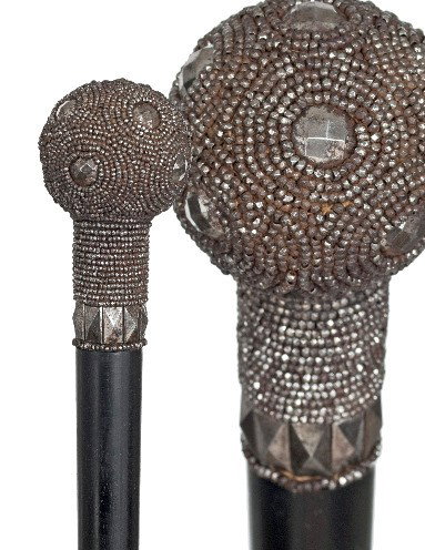 Victorian Dress Cane -Ca. 1870-A straight handle wi: Victorian Dress Cane -Ca. 1870-A straight handle with ball and stem entirely covered with faceted steel beads and faceted steel round and angular cabochons. Ebony shaft and a horn ferrule.-H 3 ¼" x 1