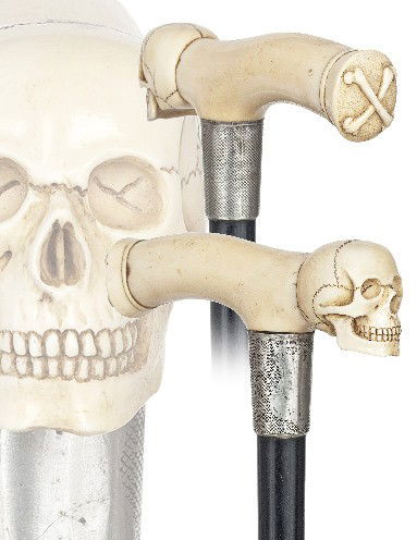 English Victorian Ivory Cane-Late 19th Century- Ope: 85 English Victorian Ivory Cane-Late 19th Century- Opera handle with a human skull and crossed bones . Engine turned silver collar with obscured hallmarks, ebony shaft and worn out ferrule. Superb qua